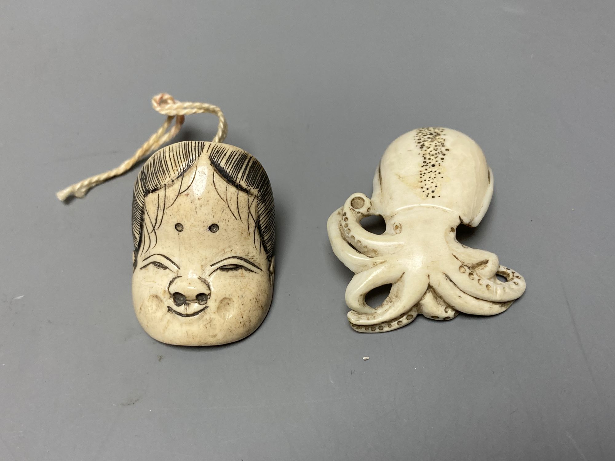 A quantity of assorted Japanese carvings, netsuke, etc.